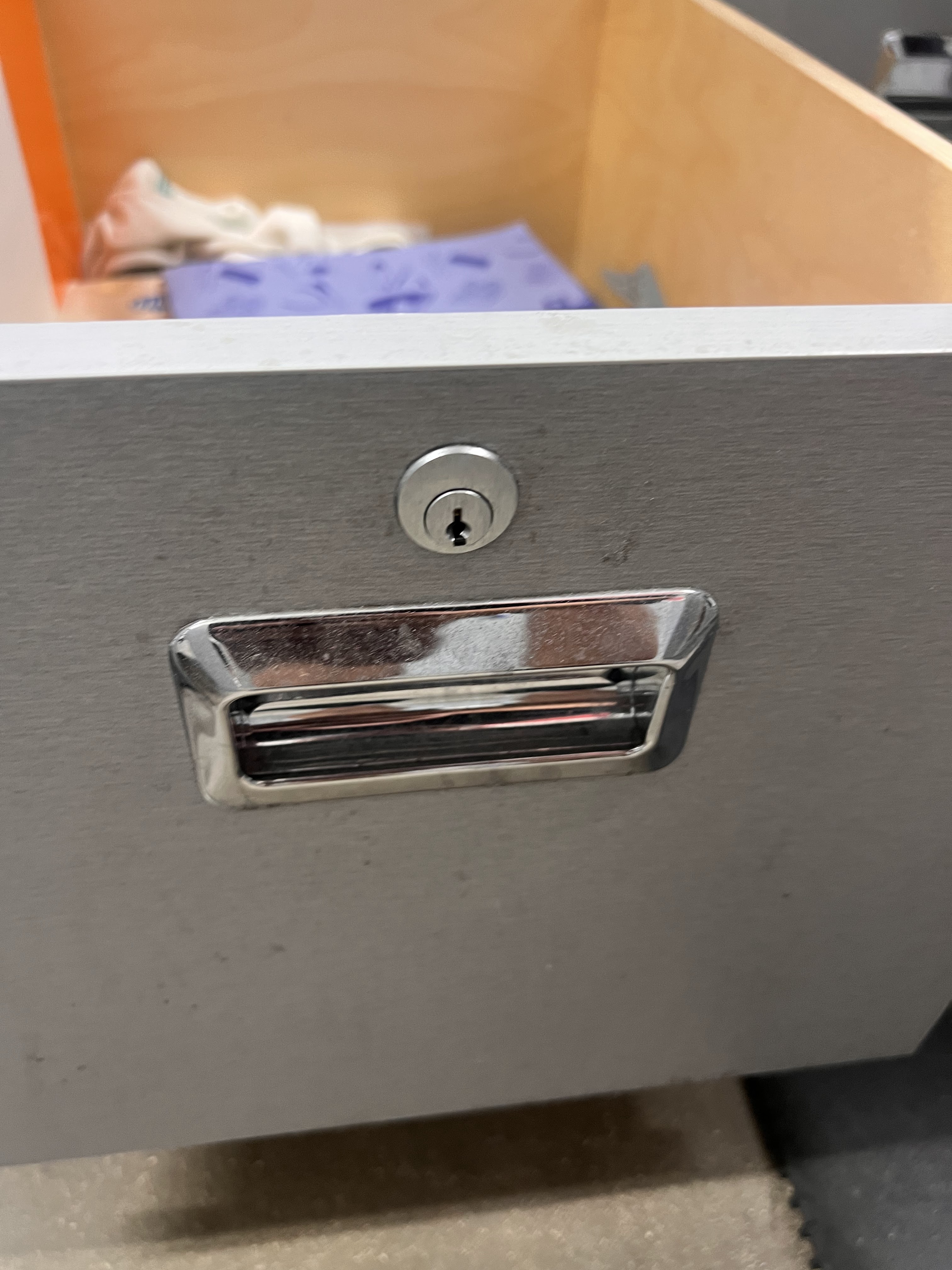 Drawer lock installation - Garage Door Lock Service - Premier Locksmith Delray Beach